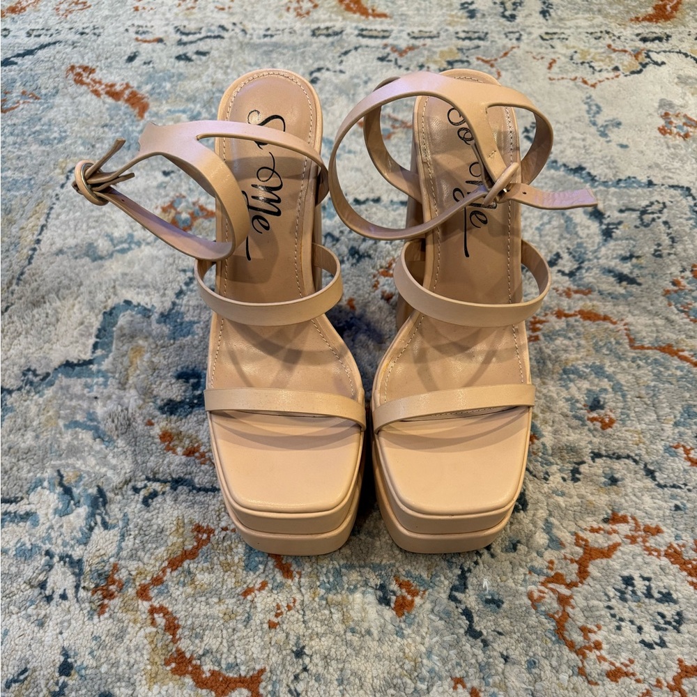 Platform heels, nude, size 8, never worn.